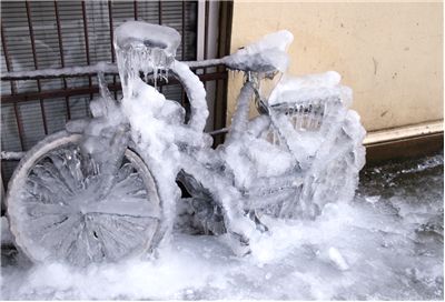 Picture Of Frozen Bicycle And Ice